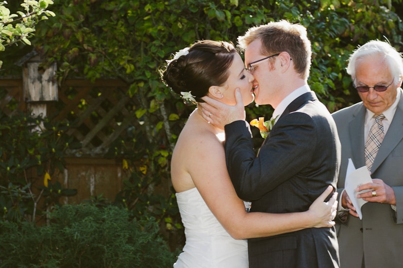 first kiss at backyard wedding