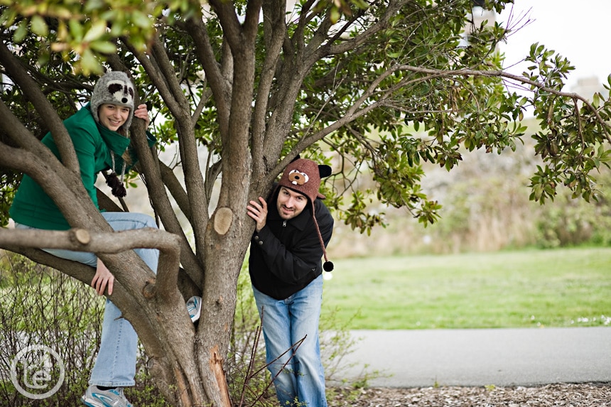 people with animal hats playing in trees