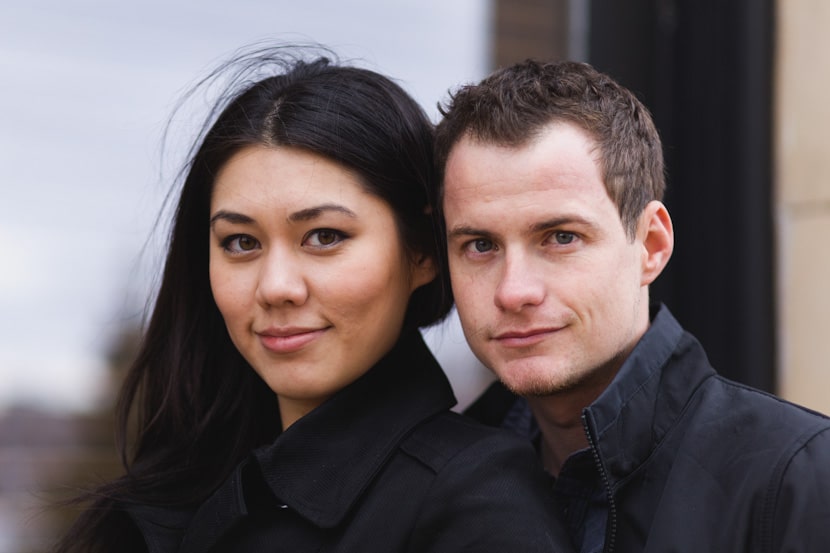 couple potraits in front of union club victoria bc