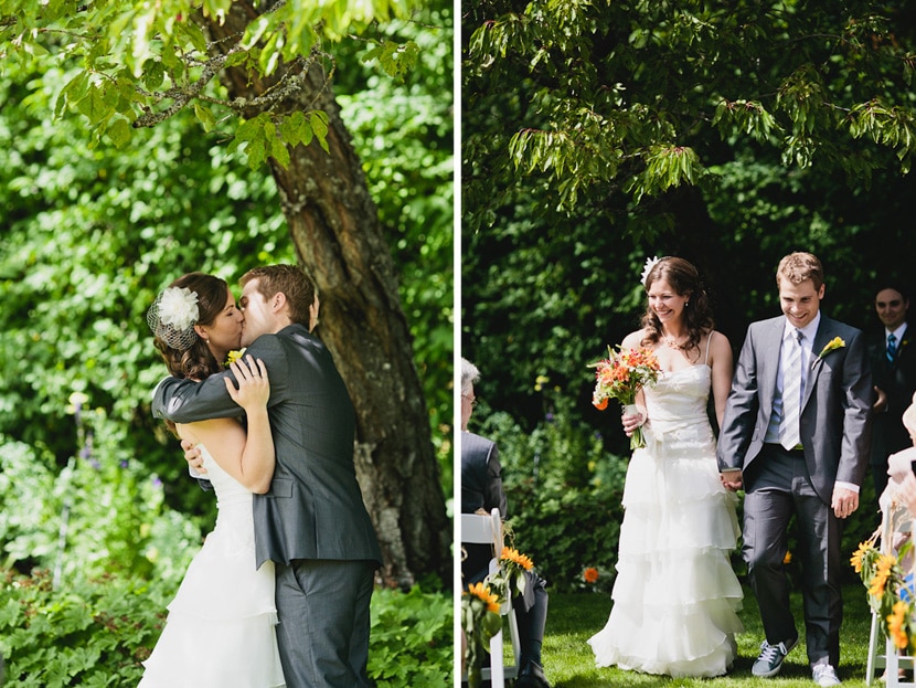first kiss and recessional at outdoor wedding venue victoria bc