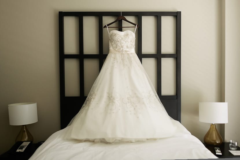 wedding dress hanging at Oswego Hotel