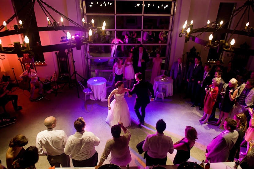 dancing and dramatic lighting at wedding reception