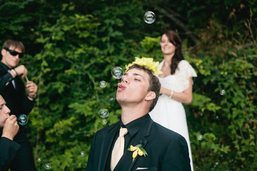 wedding party playing with bubbles in victoria bc