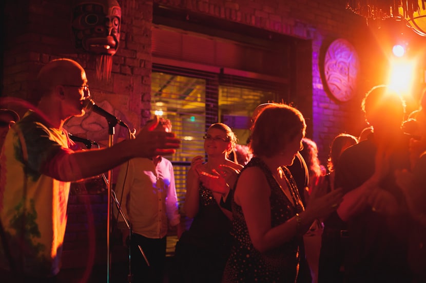 bride and groom dancing to band at swan's pub