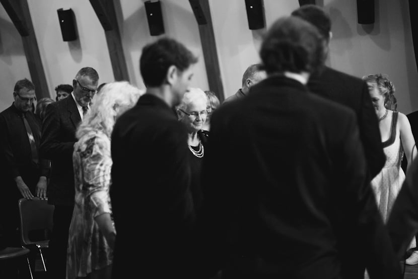 groom's mother in wedding ceremony prayer circle