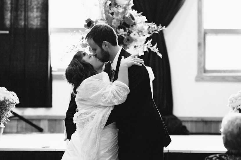 wedding ceremony kiss at pender islands community hall