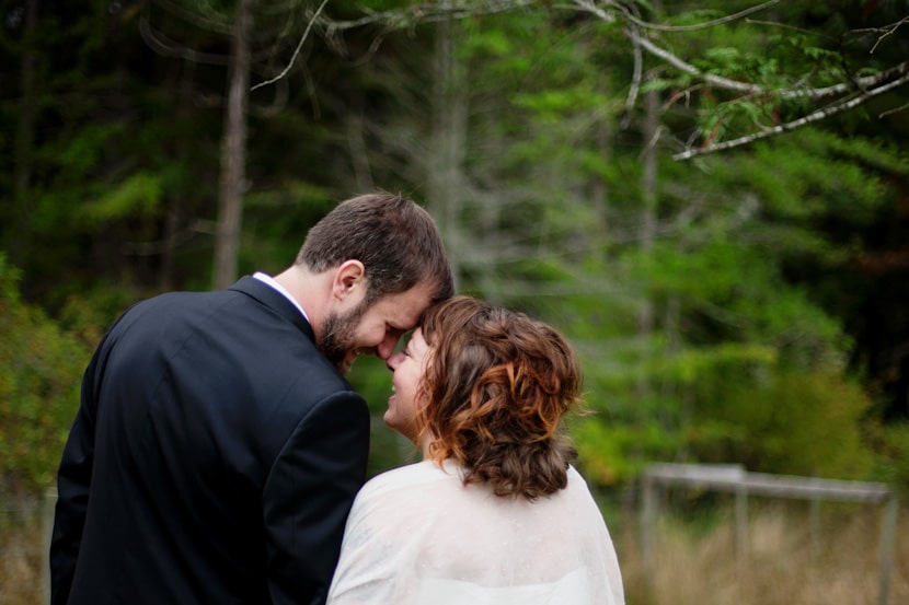 happy bride and groom portrait on pender island