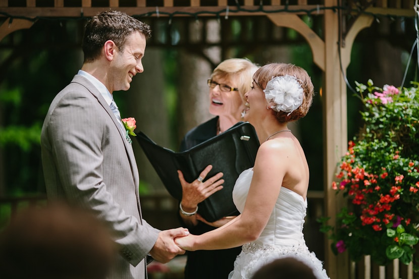 bride and groom laughing during wedding ceremony in victoria, bc