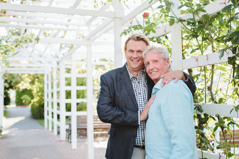 portrait of two grooms at fairmont empress hotel garden