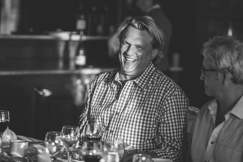 groom laughing at empress hotel reception