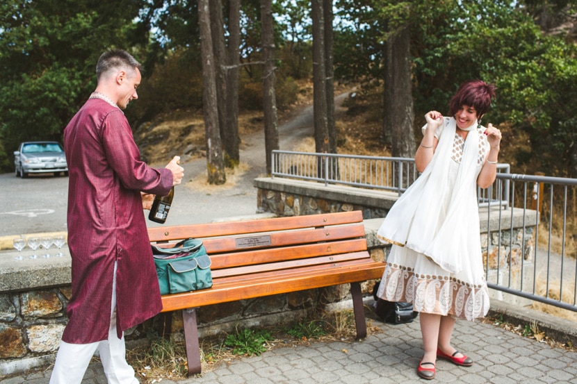 bride nervously awaiting champagne opening