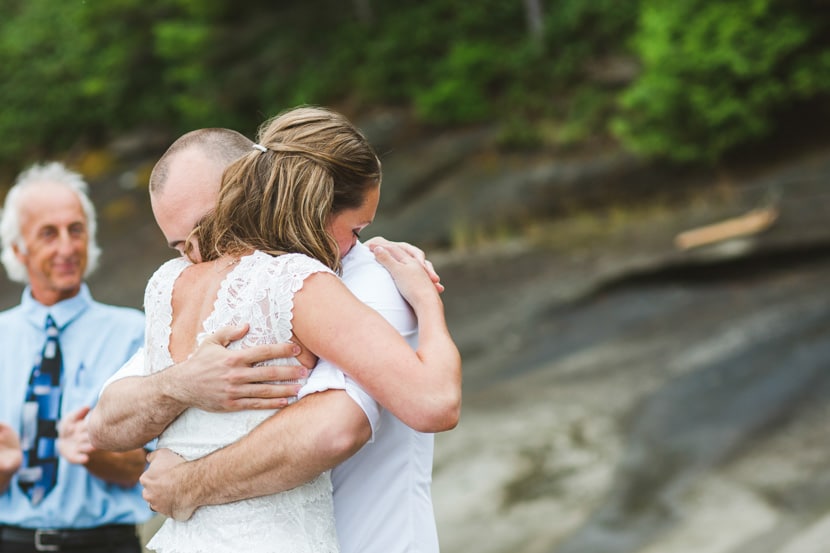 A loving embrace between the newlyweds