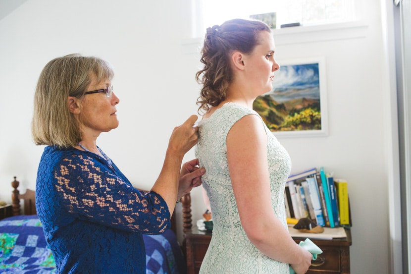 bride and mother of the bride getting ready for wedding