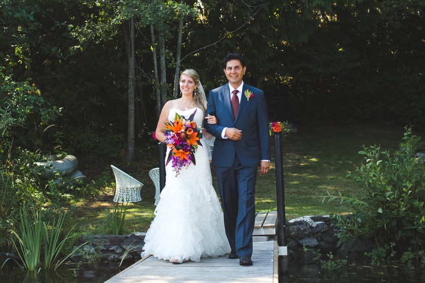 bride and father walking down aisle at prospect lake wedding