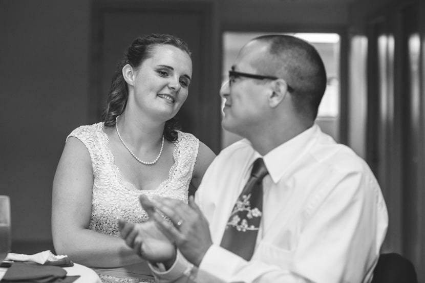 couple listening to toasts at prospect lake community hall