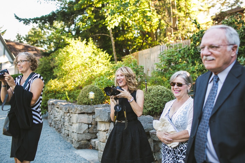 guests taking photos at salt spring island wedding