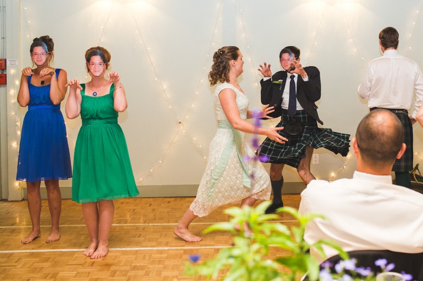 wedding party and bride doing choreographed dance