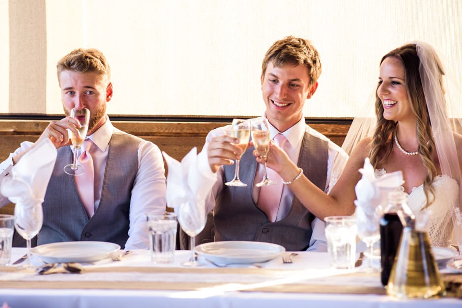 couple toasting during wedding reception