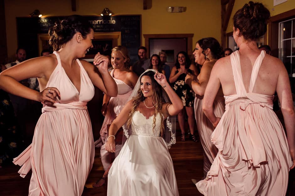 bridesmaids dancing around bride to spice girls