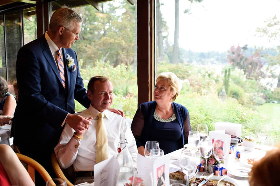 guests and groom share affection