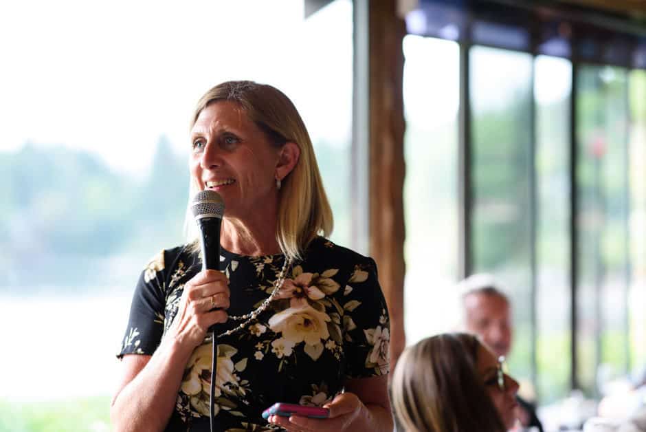 groom's sister giving wedding toast