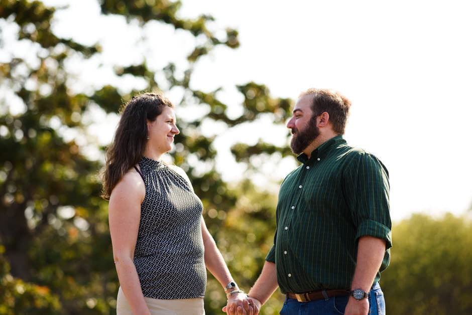 couple holding hands at cattle point