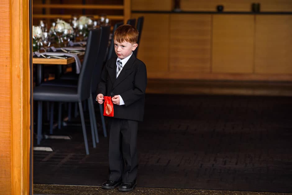 ring bearer with red ring bag