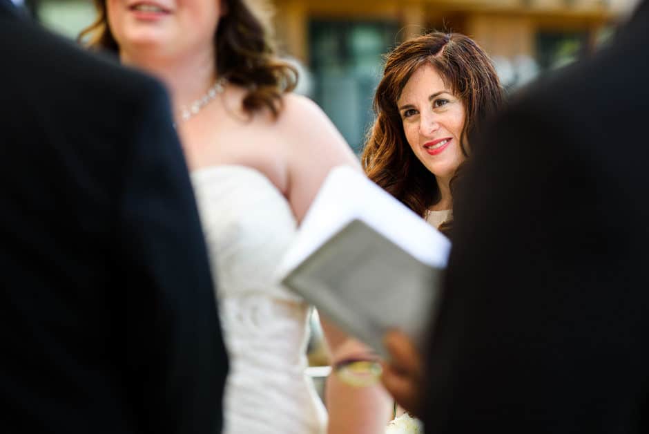 lady of honour watching wedding ceremony