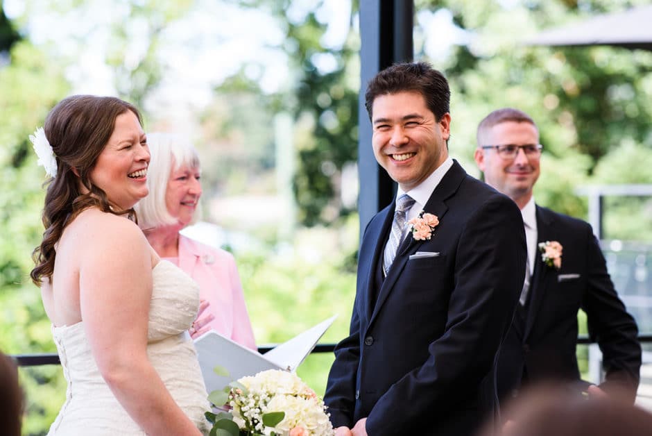 couple laughing during wedding ceremony