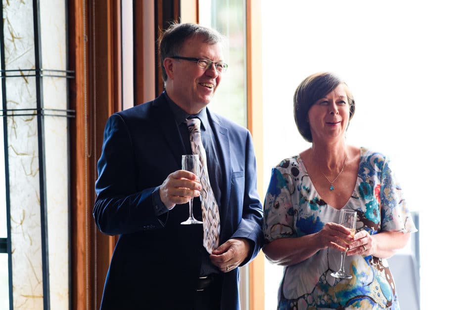 bride's parents toasting couple