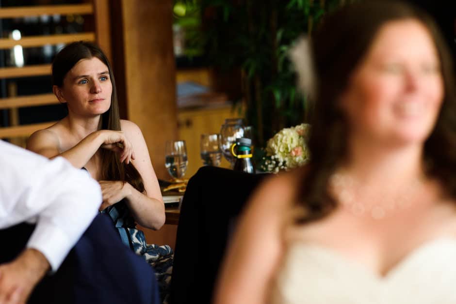 bride's sister listening to toast