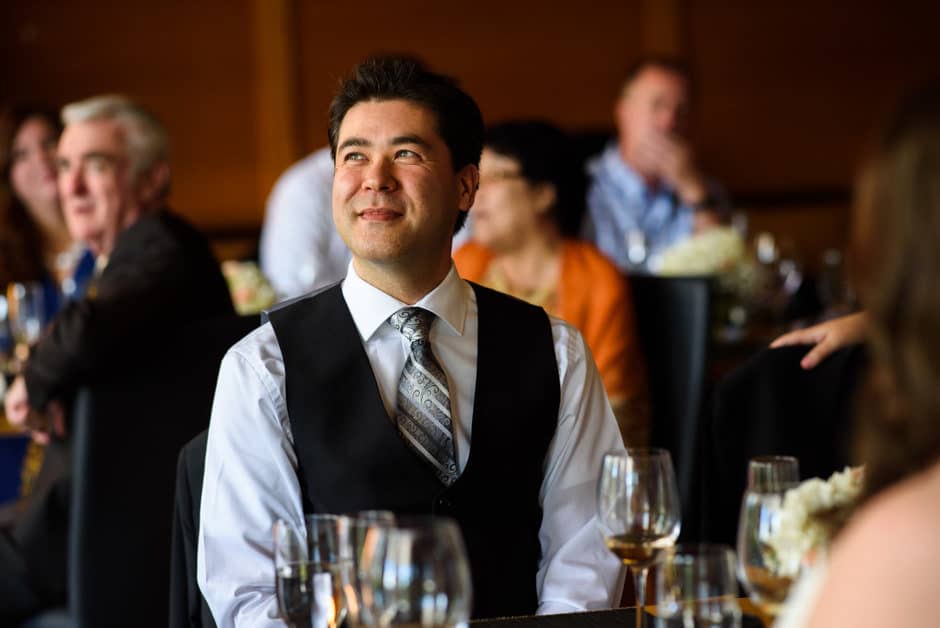 groom listening to toast