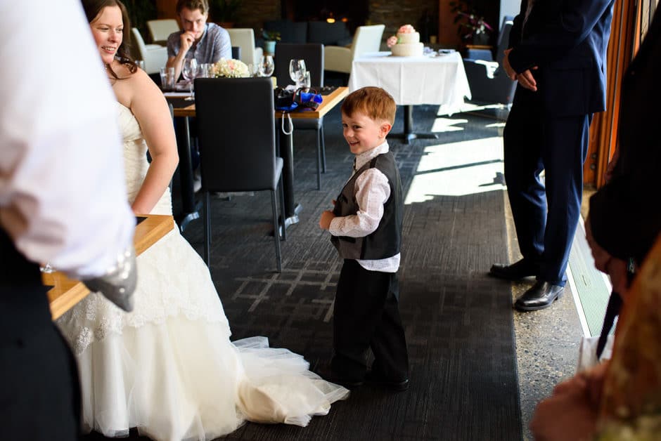 ring bearer reacting to mickey mouse gloves