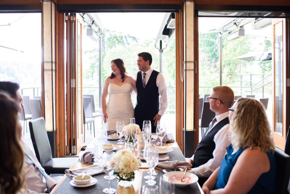 bride and groom giving thank you speech