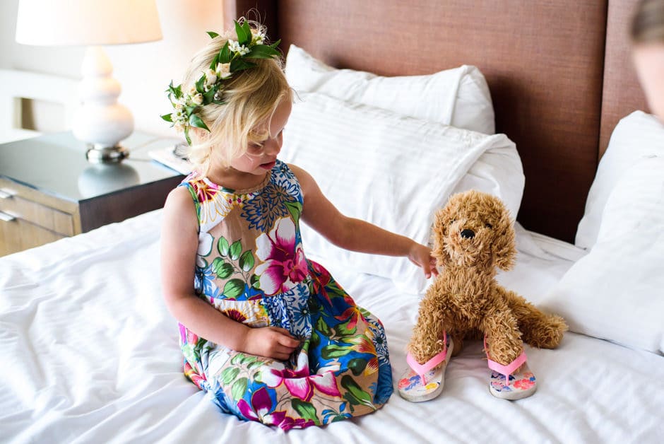 flower girl with stuffed dog