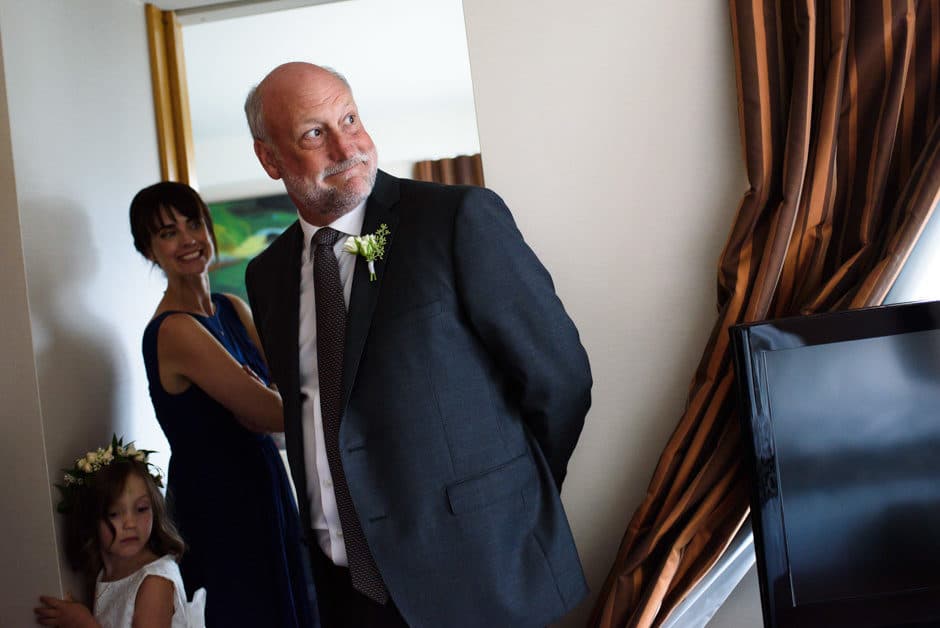 bride's father seeing her in her dress