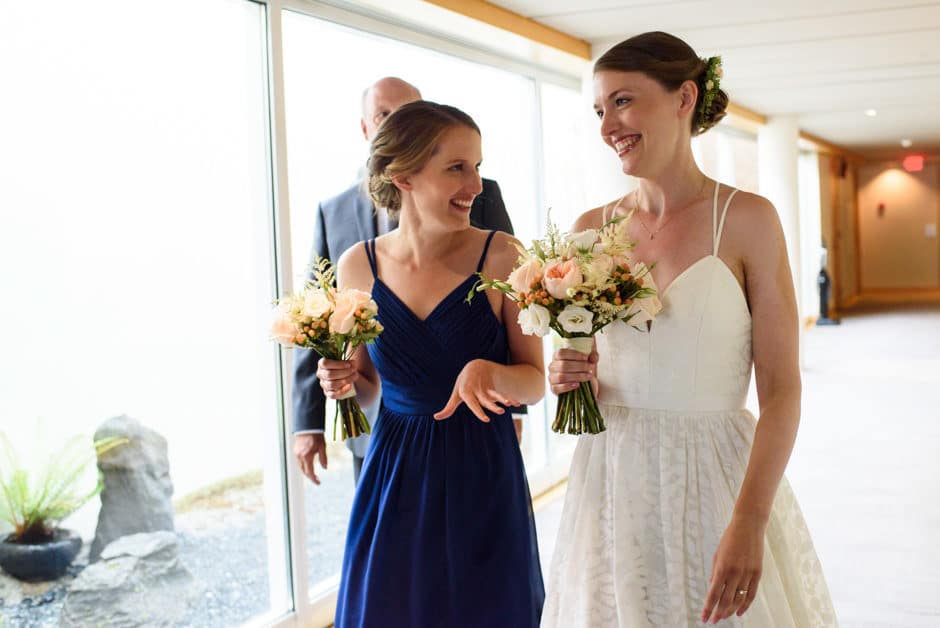 bride and maid of honour heading to ceremony