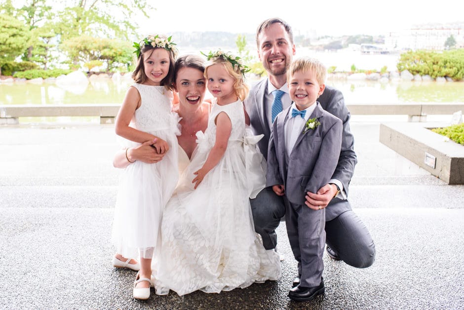 couple with flower girls and ring bearer