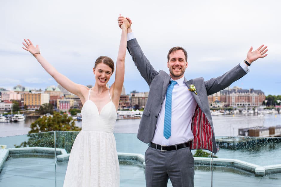 couple cheering at wedding