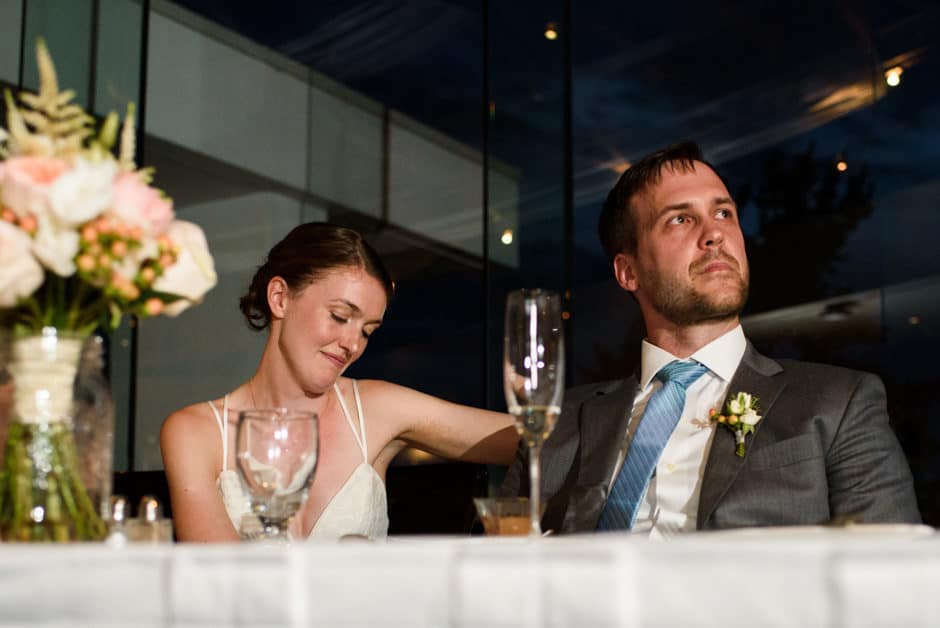 bride and groom's emotional toast reaction