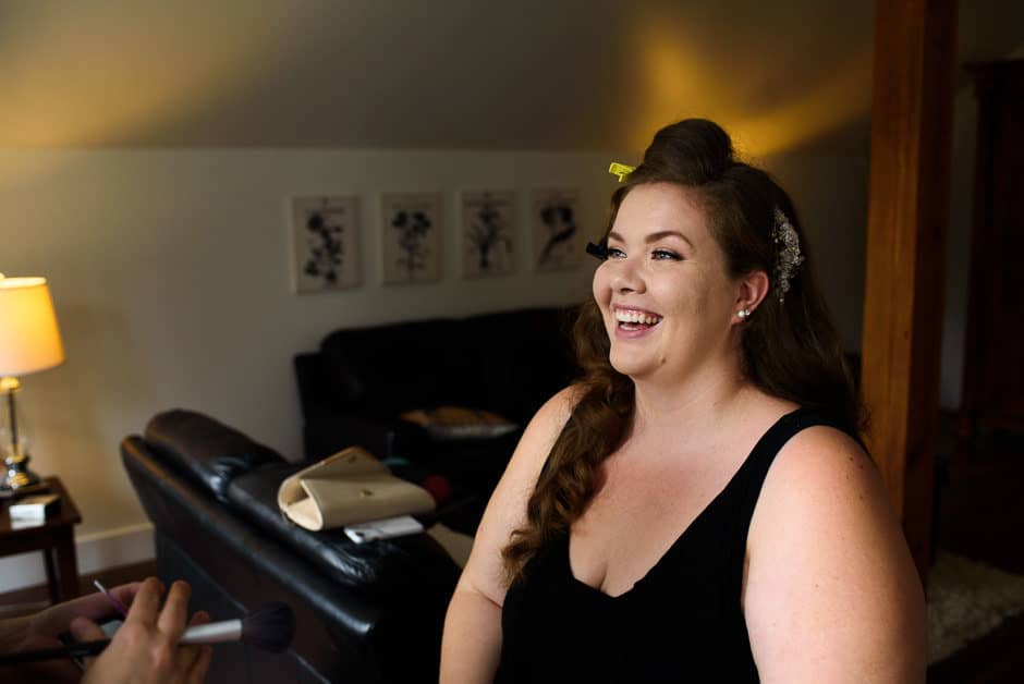 bride laughing during getting ready