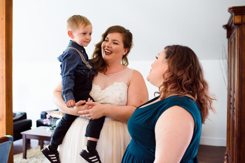 bride with bridesmaid's son