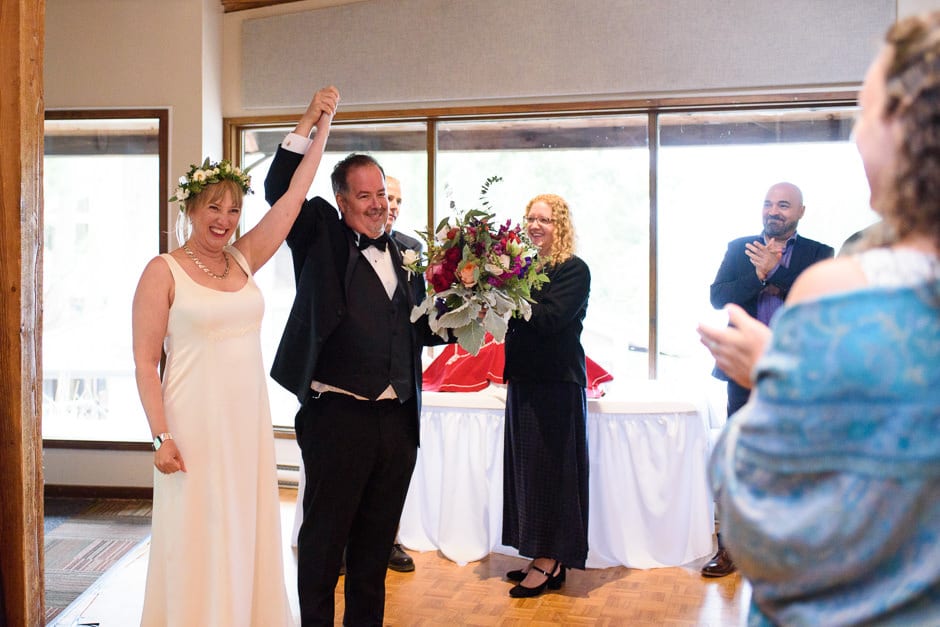 bride and groom entering reception