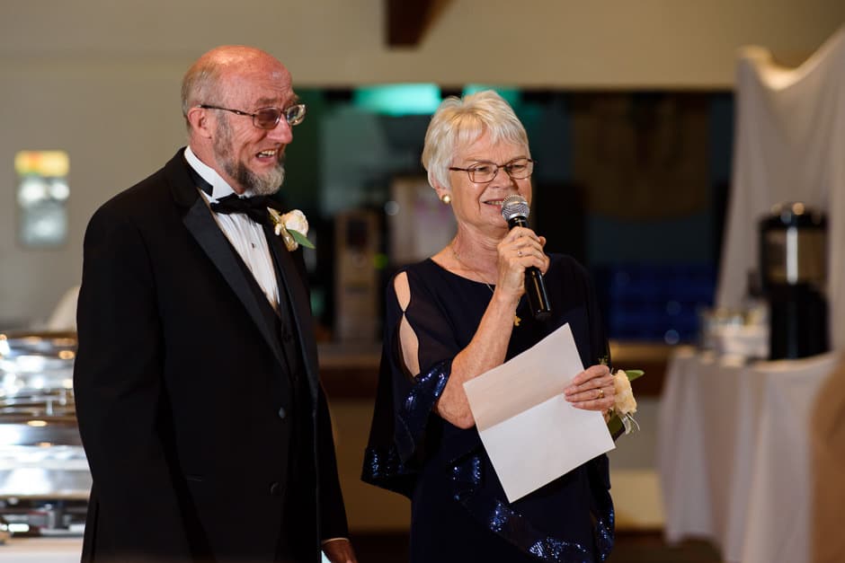 bride's parents toasting couple