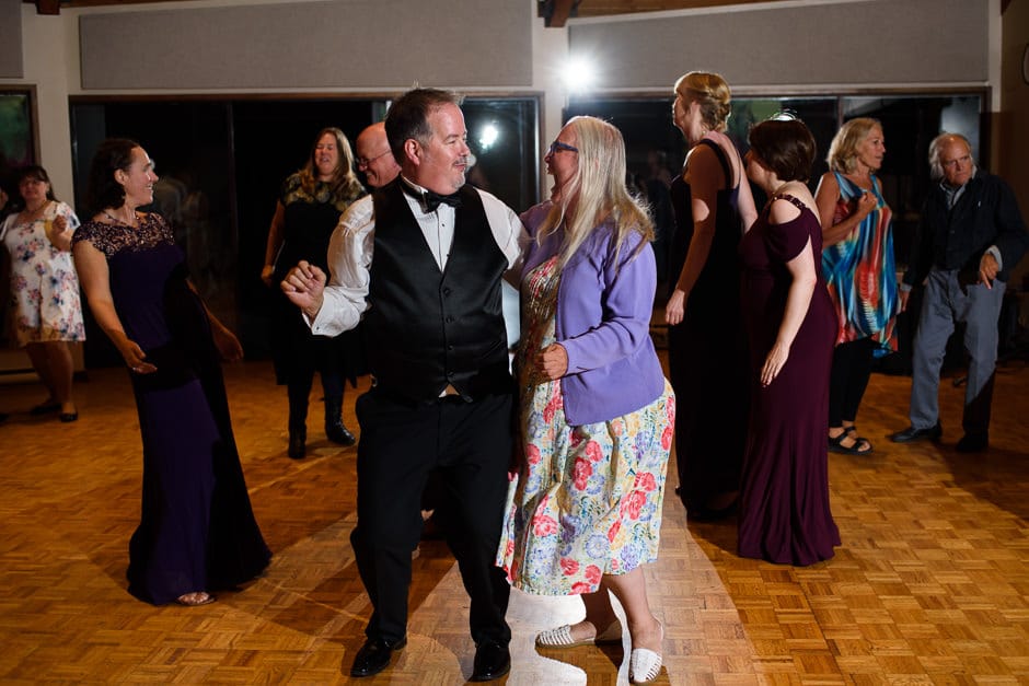 groom dancing with guest