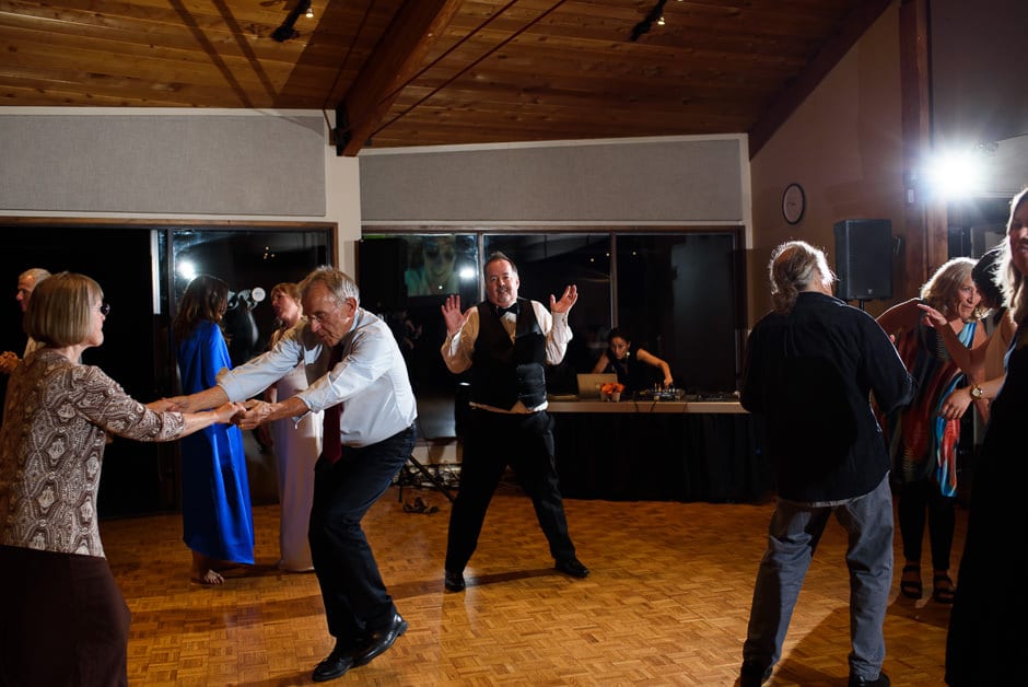 groom dancing in gap in crowd