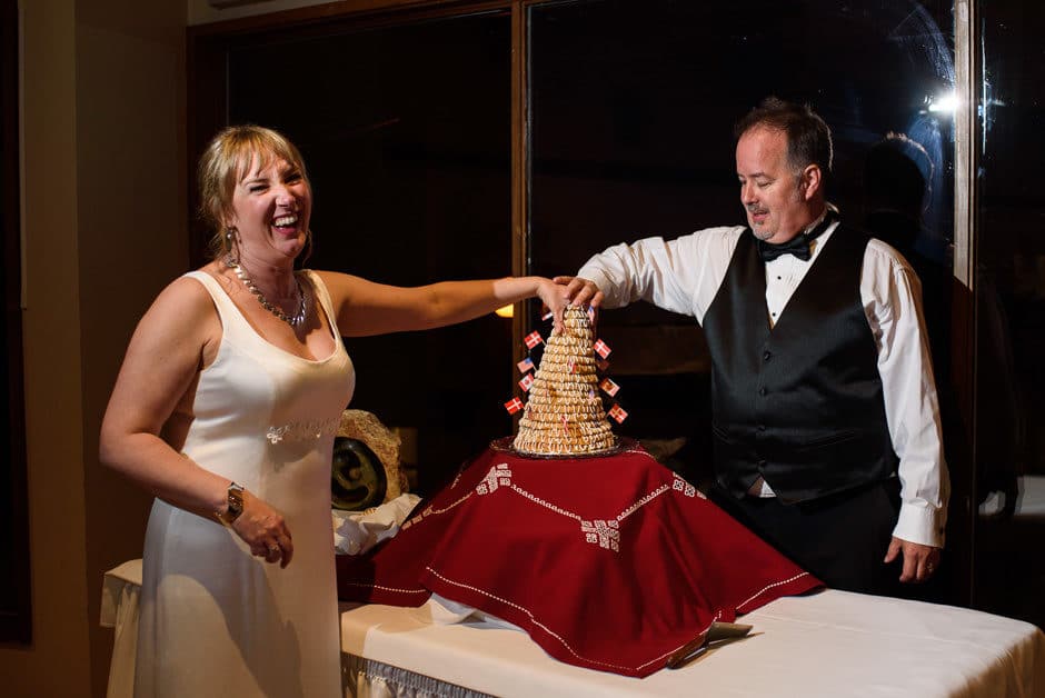 couple breaking Kransekake 