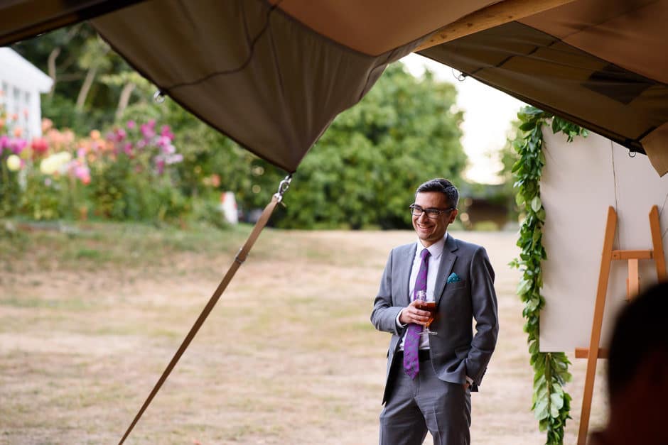 bride's brother listening to toast