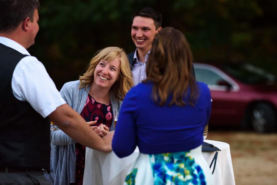 guests laughing at wedding