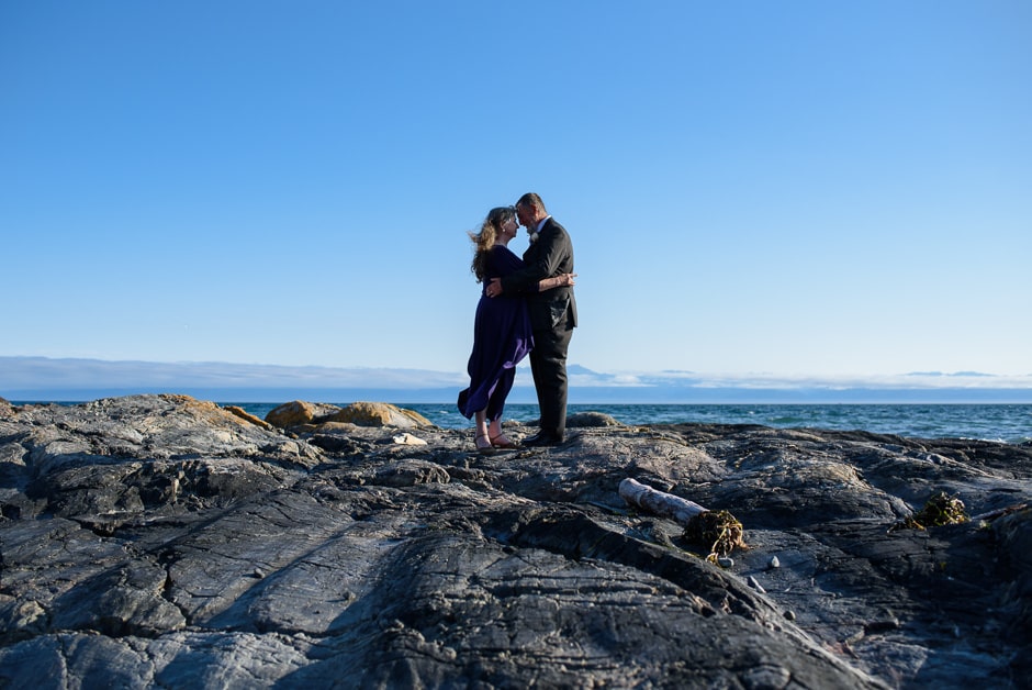 oceanfront landscape photo with married couple